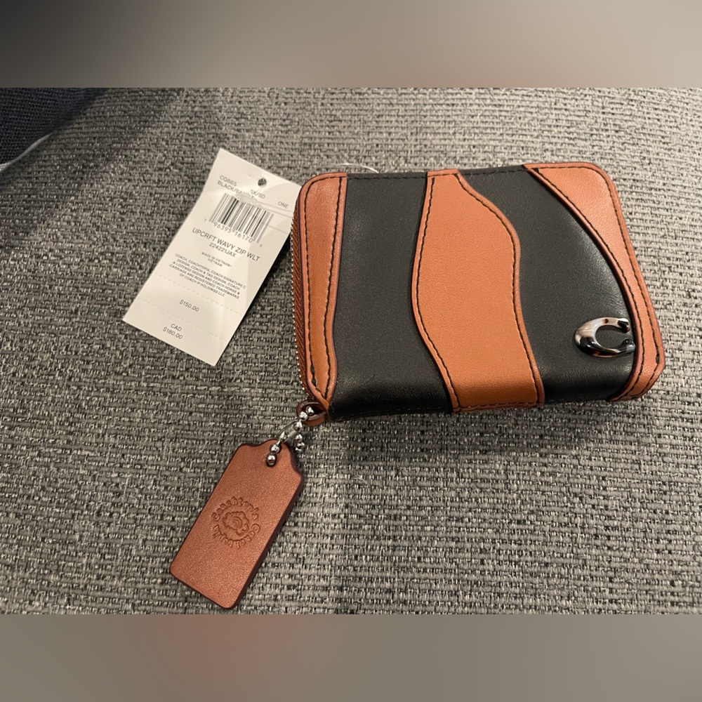 Coachtopia Black and Tan Leather Wallet
